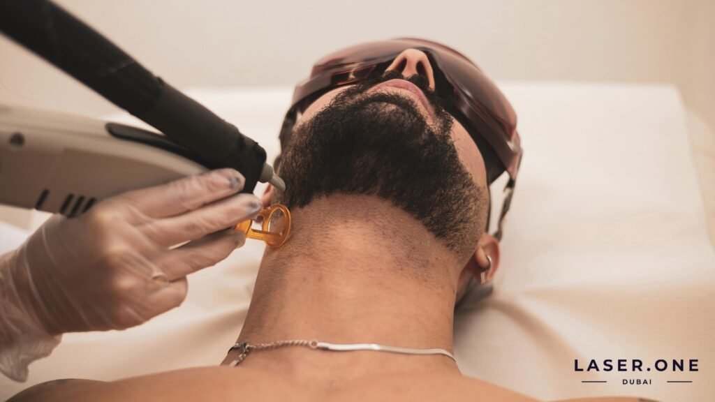 Russian speaking technician shaping a man's beard line with Diode laser in Business Bay